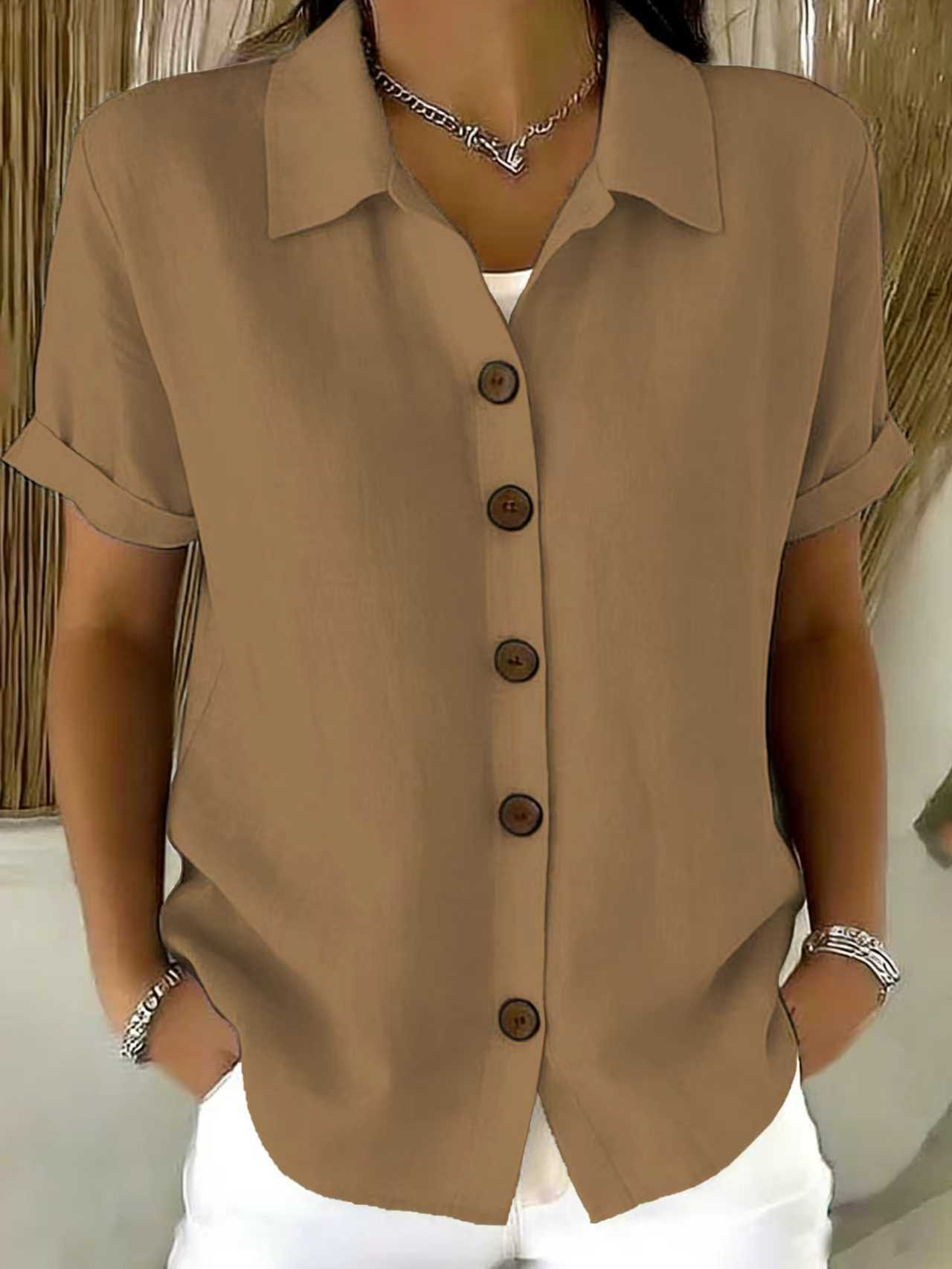 Top de manga corta con cuello camisero y botones
