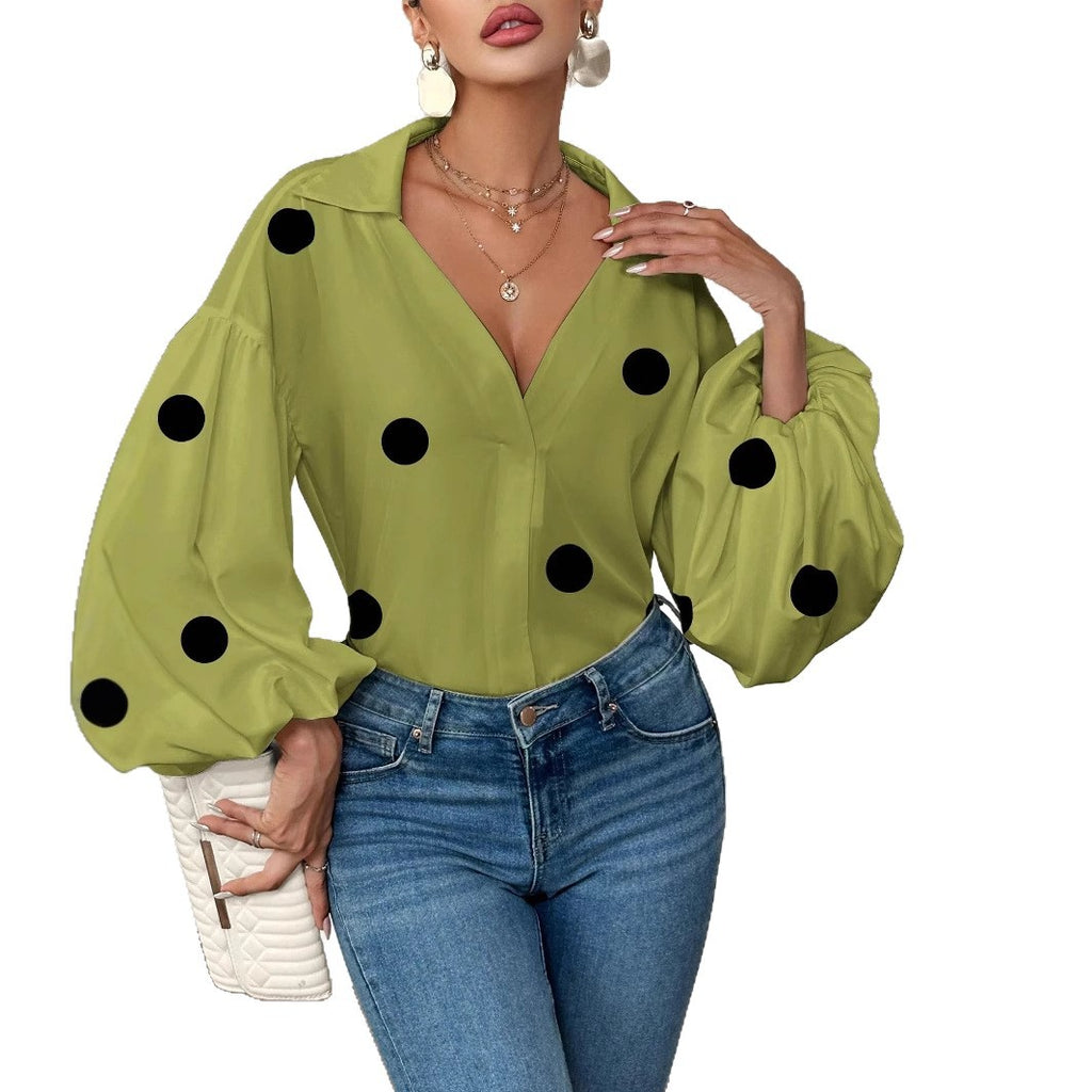 Long-sleeve polka dot top with a half-zip neck