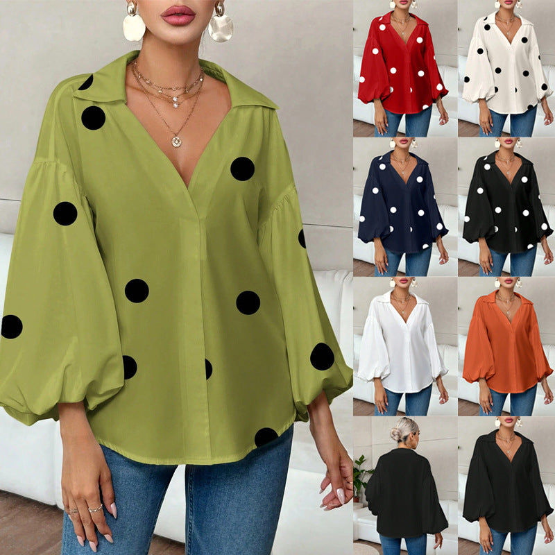 Long-sleeve polka dot top with a half-zip neck