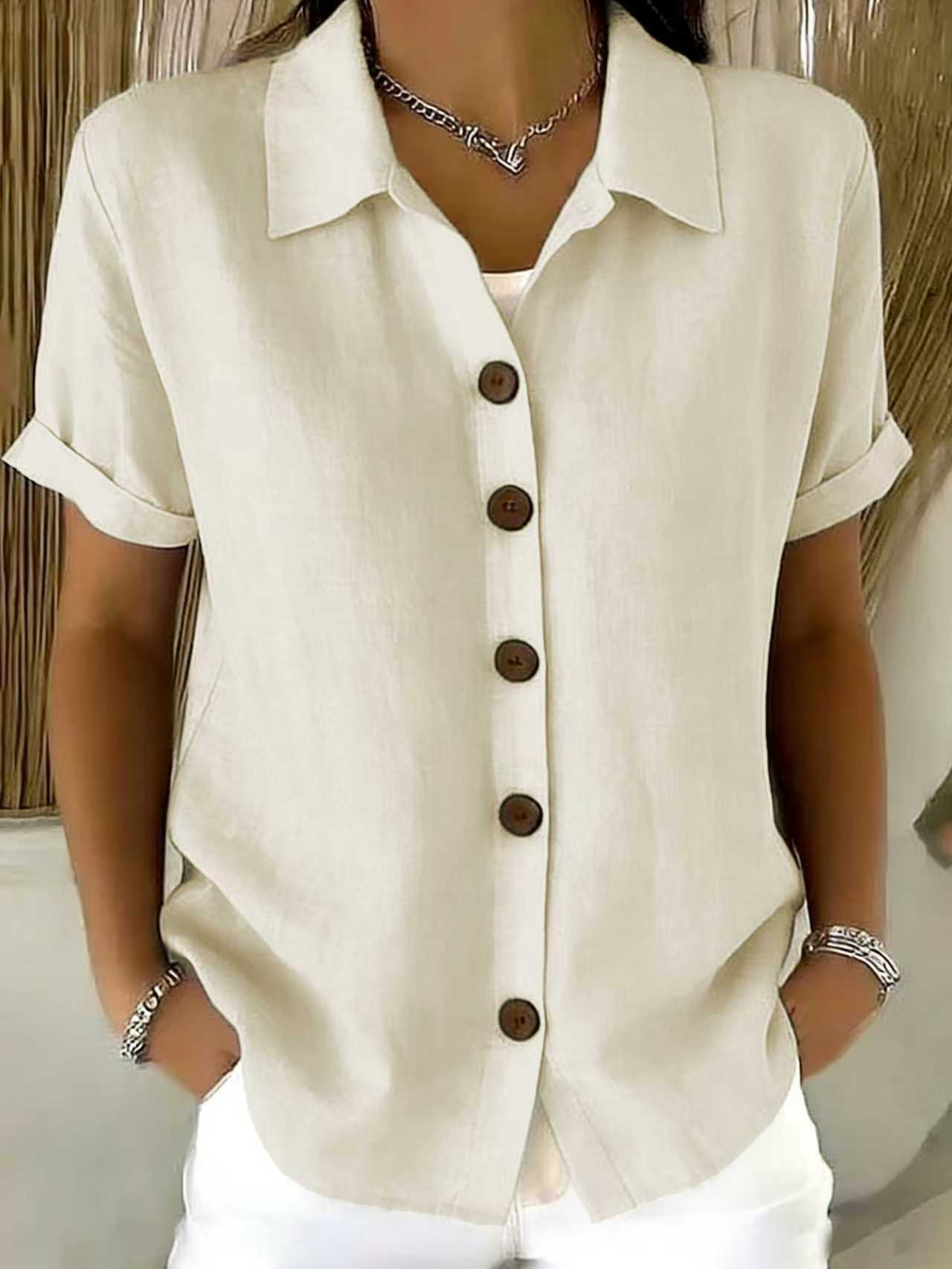 Top de manga corta con cuello camisero y botones