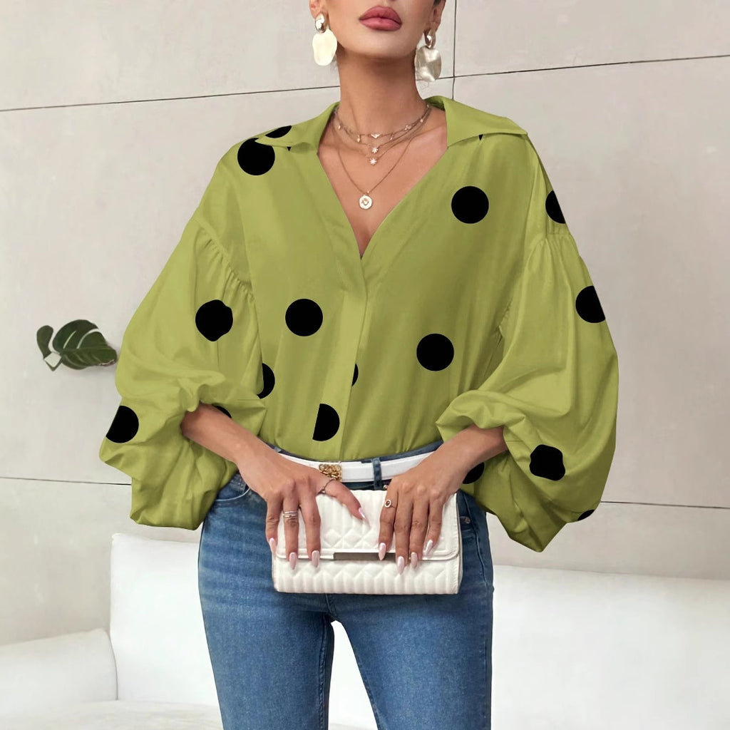 Long-sleeve polka dot top with a half-zip neck