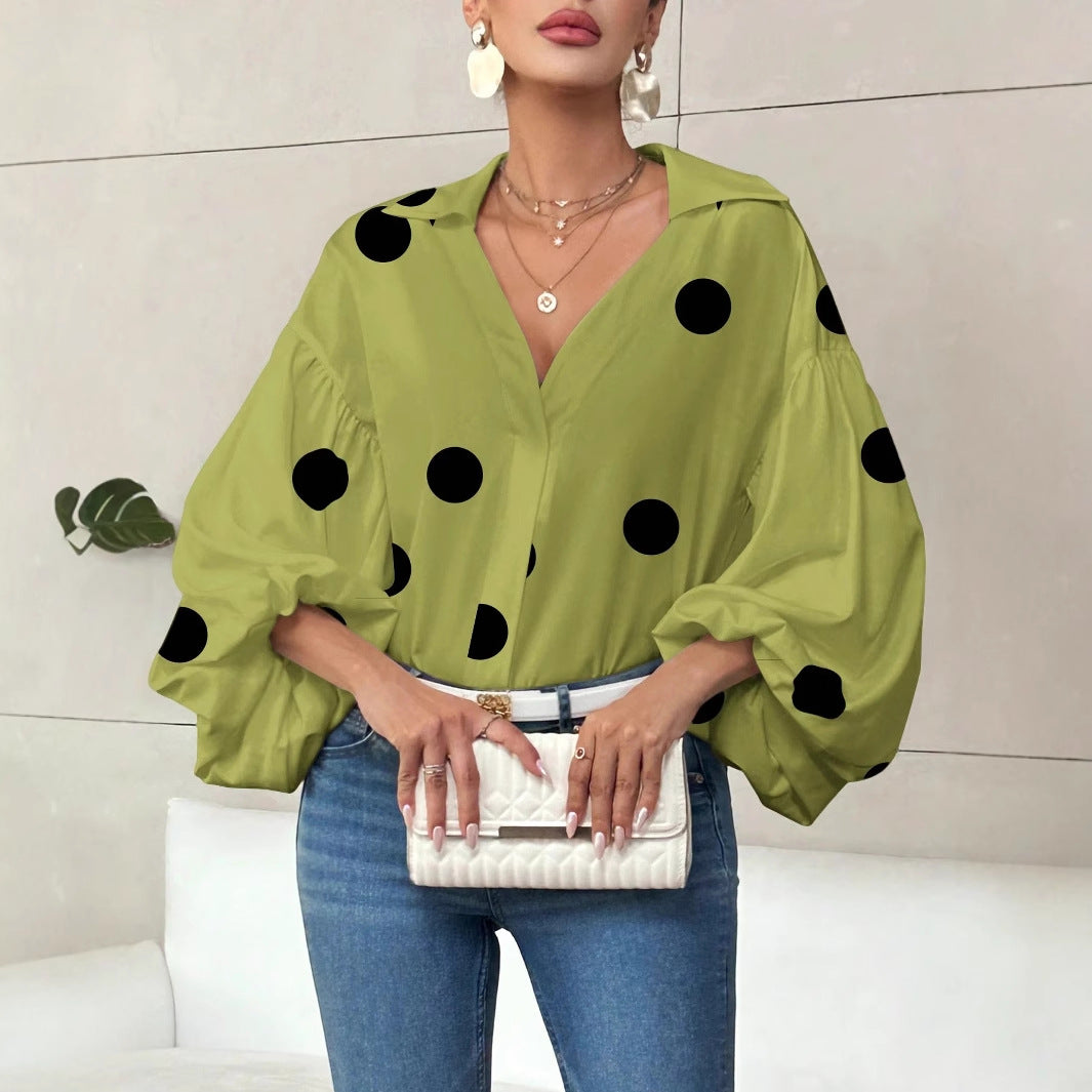Long-sleeve polka dot top with a half-zip neck