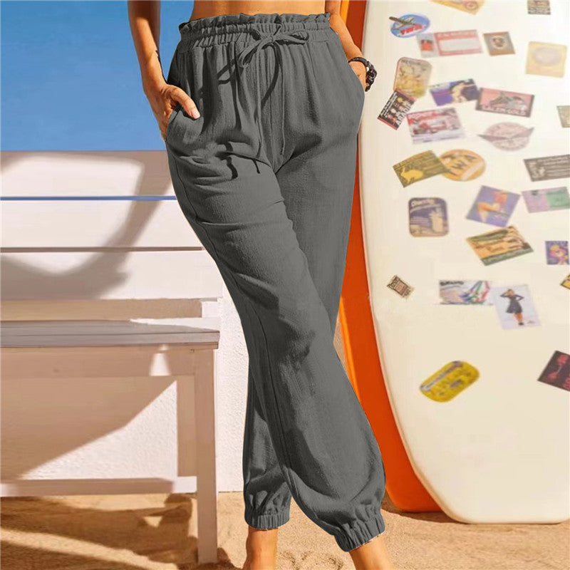 Pantalón de lino con cintura elástica y bajo en pétalo