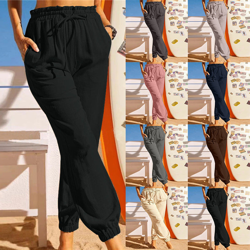 Pantalón de lino con cintura elástica y bajo en pétalo