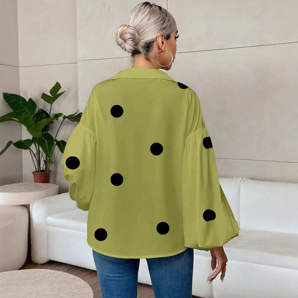 Long-sleeve polka dot top with a half-zip neck