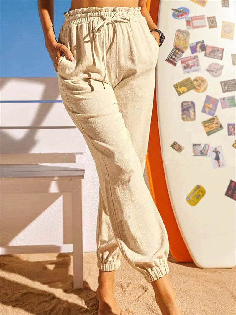 Pantalón de lino con cintura elástica y bajo en pétalo