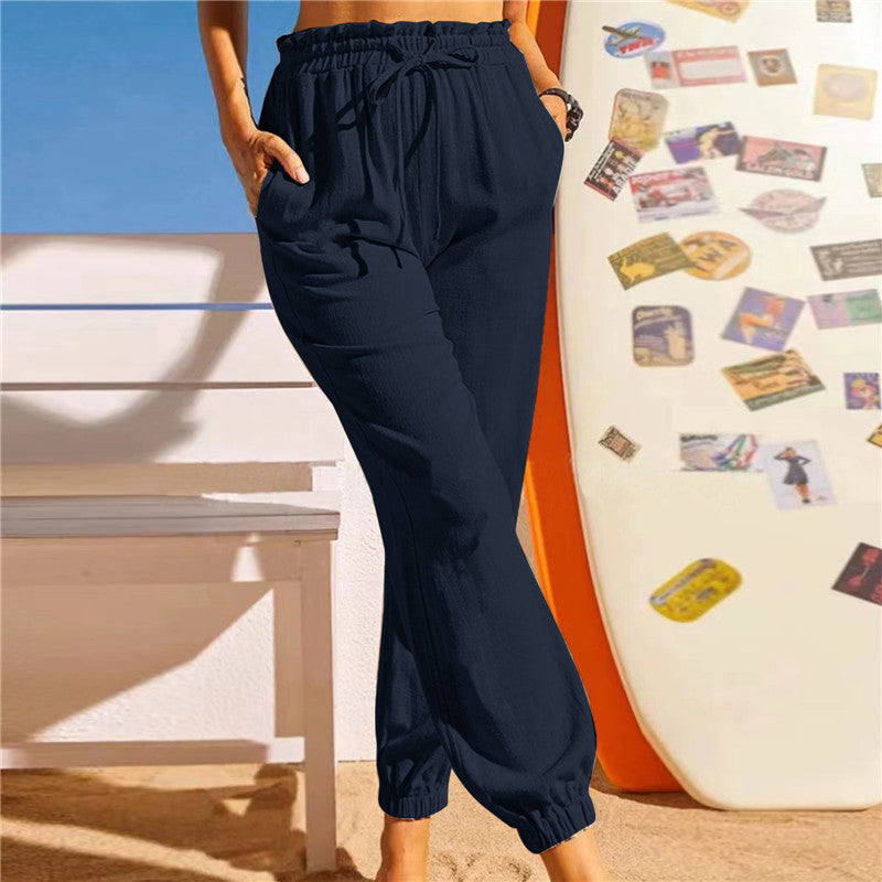 Pantalón de lino con cintura elástica y bajo en pétalo